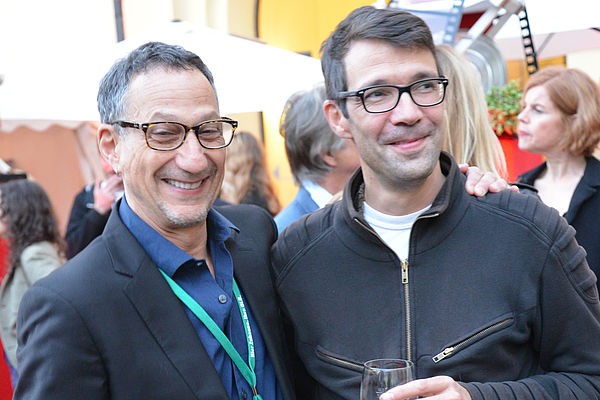 07 Oldenburg Alums producer Ken Meyer actor Arno Frisch sharing the spirit at the Castle Reception hosted by Audi Zentrum Oldenburg