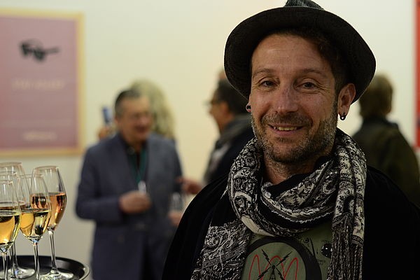 16 King of Beasts director Tomer Almagor takes in the spirit of the Fest at the Exhibition Reception.
